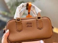 miumiu女孩什么意思,miumiu属于什么档次